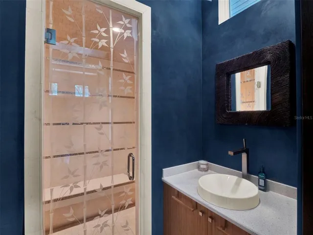 a bed room with a bed and a window