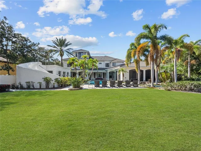 a view of a house with a big yard