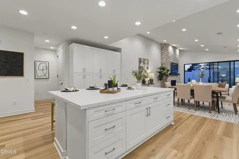 a kitchen with counter top space and a sink