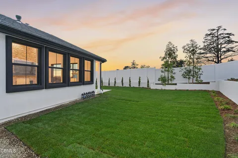 a view of building with yard