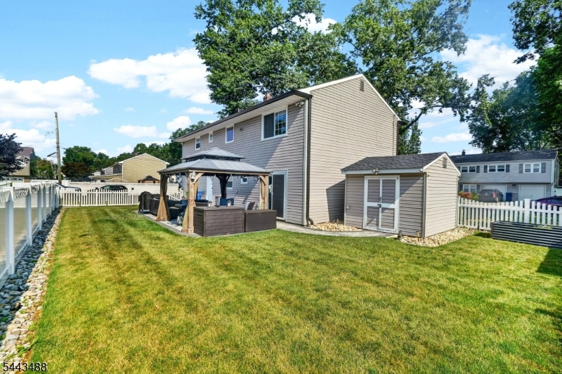 151 East Prospect Street Clark, NJ 07066 - Photo 28 of 31 a view of a house with a swimming pool