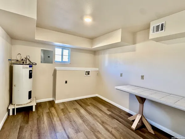 a room with a table and chairs