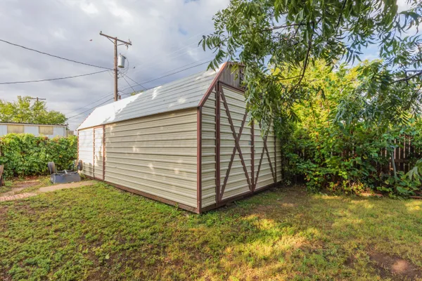 a view of a backyard with a garden