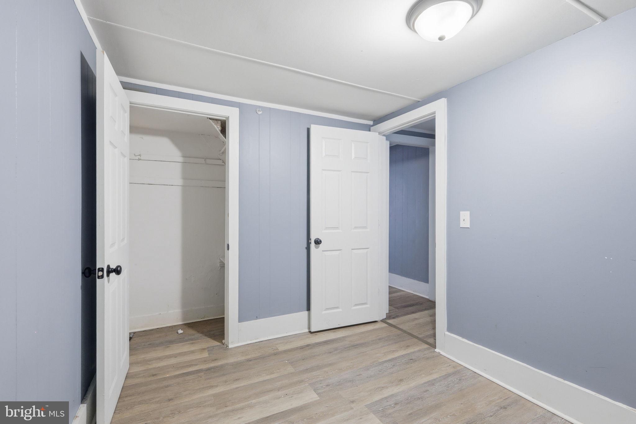 60 Walnut Street Salem, NJ 08079 - Photo 16 of 25 Spacious room with serene blue walls.