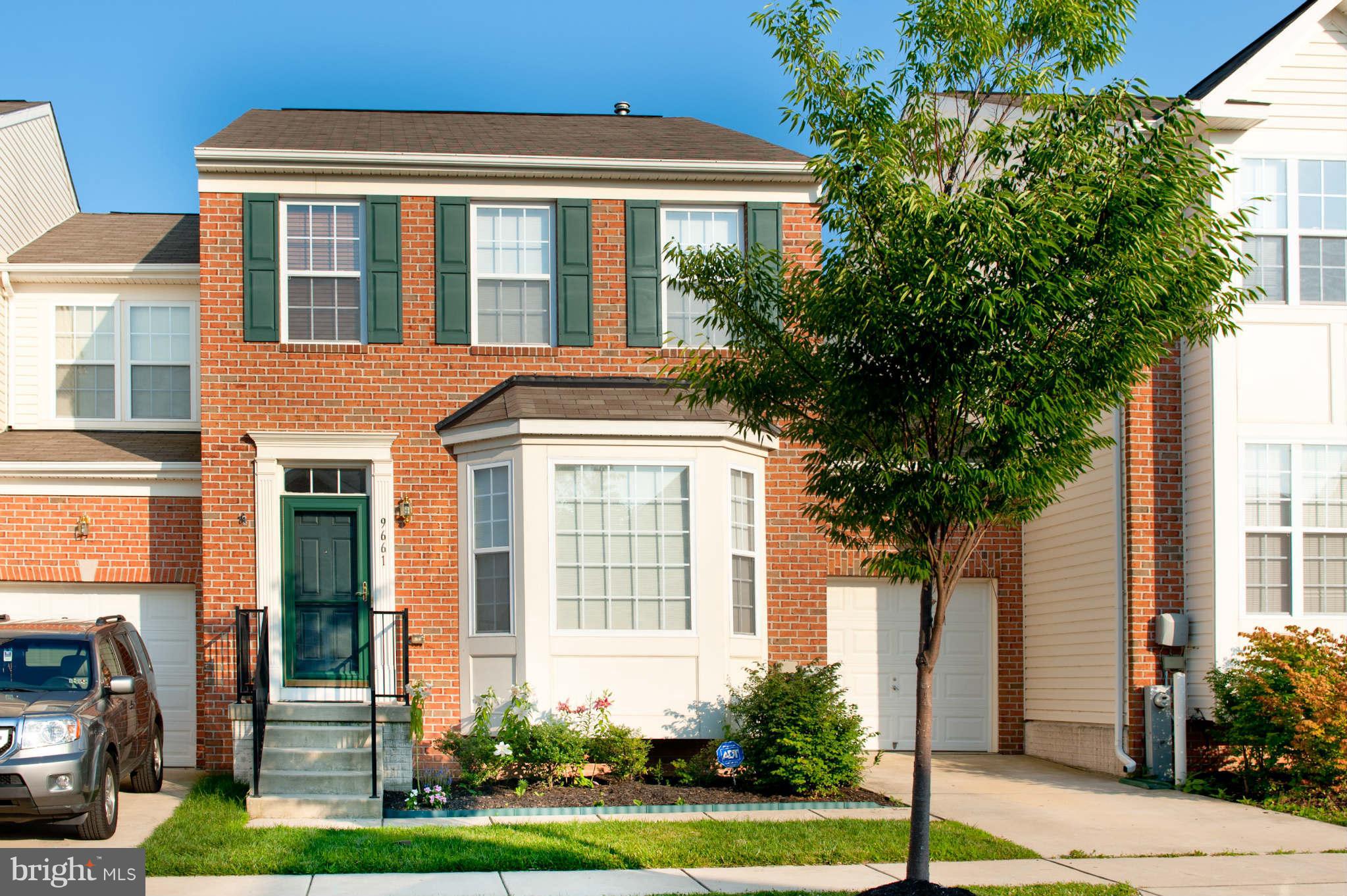 9661 Biggs Road Baltimore, MD 21220 - Photo 1 of 25 a front view of a building with a garden and plants