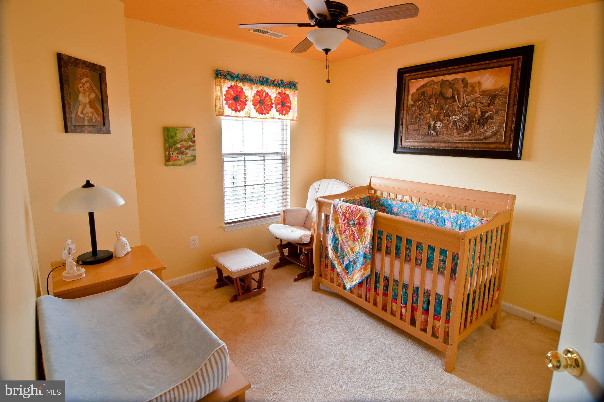 9661 Biggs Road Baltimore, MD 21220 - Photo 13 of 25 a bedroom with furniture and windows