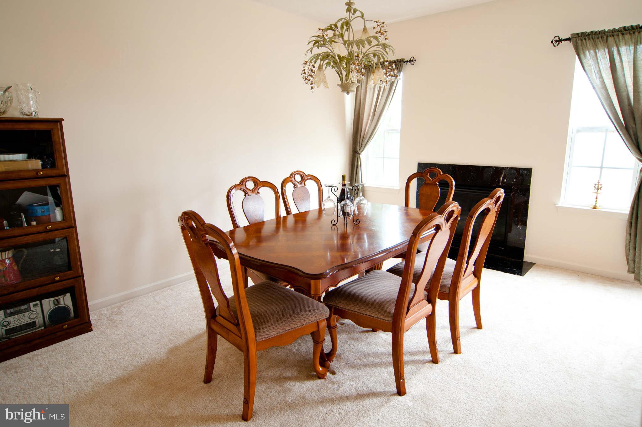 9661 Biggs Road Baltimore, MD 21220 - Photo 7 of 25 a dining room with furniture and window