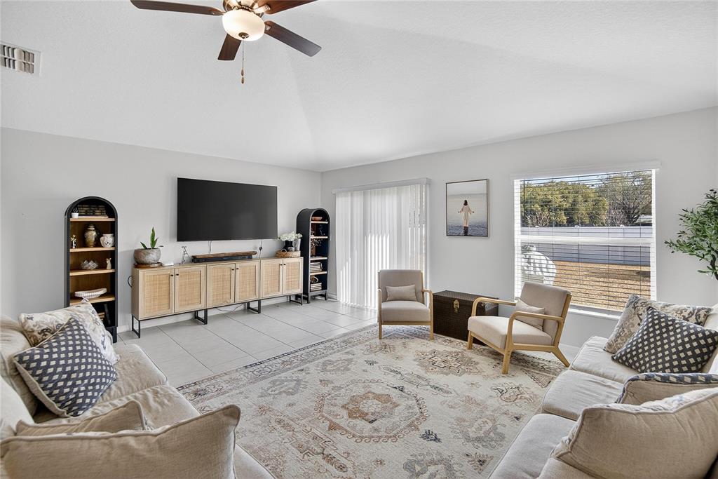 2950 Flying Blackbird Road Bartow, FL 33830 - Photo 20 of 41 a living room with furniture and a flat screen tv