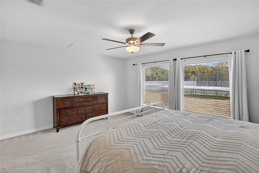 2950 Flying Blackbird Road Bartow, FL 33830 - Photo 25 of 41 a bedroom with a bed and window