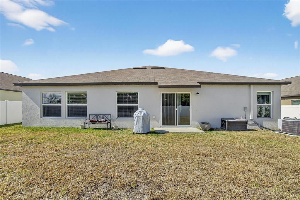 2950 Flying Blackbird Road Bartow, FL 33830 - Photo 35 of 41 a house view with a sitting space and garden