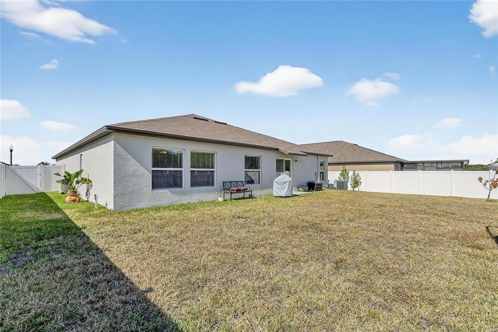 2950 Flying Blackbird Road Bartow, FL 33830 - Photo 37 of 41 a view of a house with backyard and garden