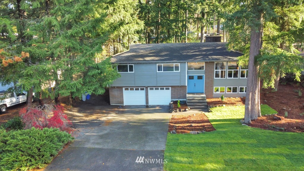 14628 164th Place Southeast Renton, WA 98059 - Photo 3 of 34 a view of a house with backyard and sitting area