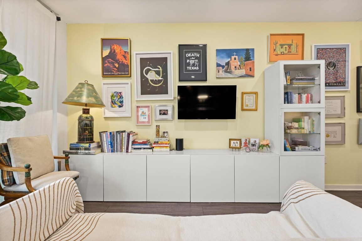 4361 South Congress Avenue, Unit 427 Austin, TX 78745 - Photo 2 of 33 a living room with furniture and a flat screen tv