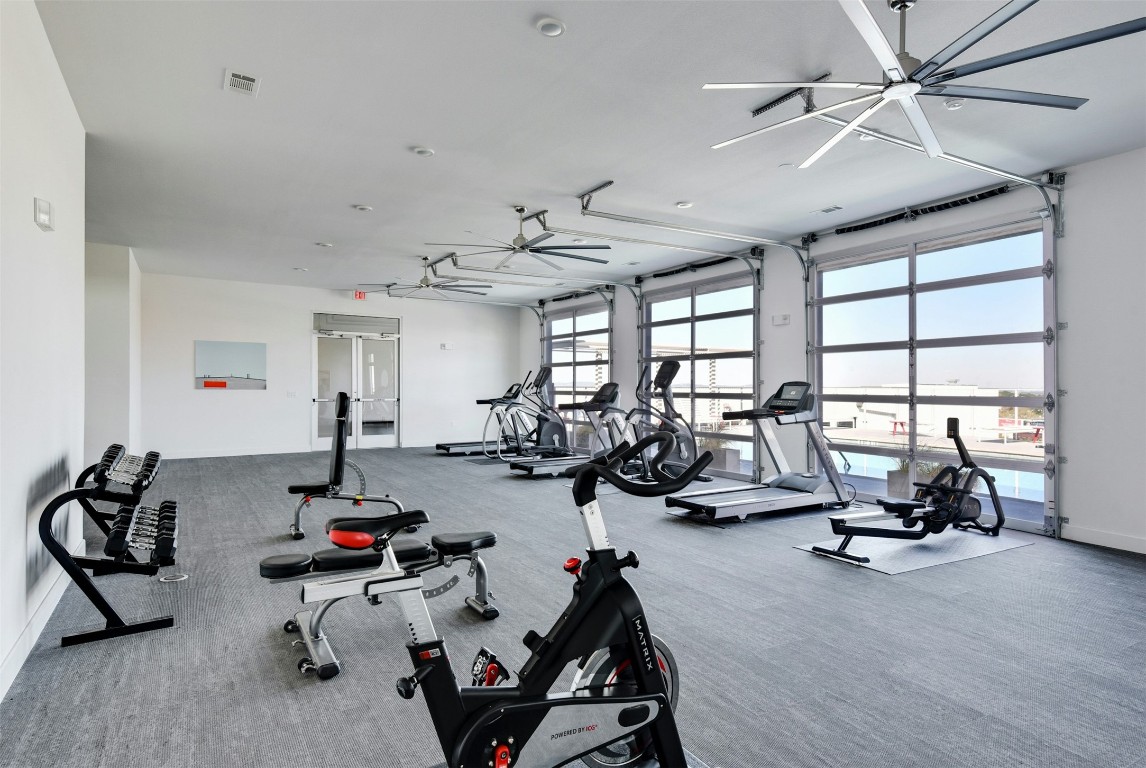 4361 South Congress Avenue, Unit 427 Austin, TX 78745 - Photo 22 of 33 a view of a room with gym equipment
