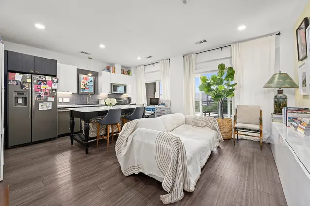 a bed room with furniture and a table