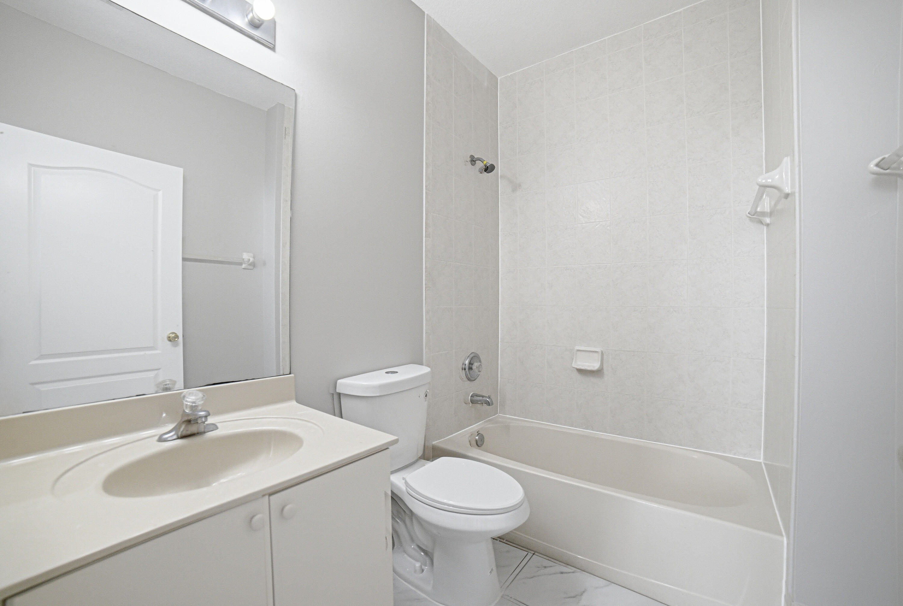 7301 Northwest 174th Terrace, Unit 100 Hialeah, FL 33015 - Photo 11 of 16 Bathroom1