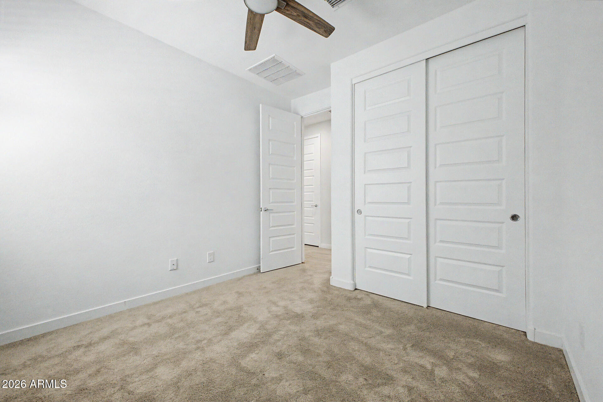 23080 East Stacey Road Queen Creek, AZ 85142 - Photo 31 of 42 an empty room with closet