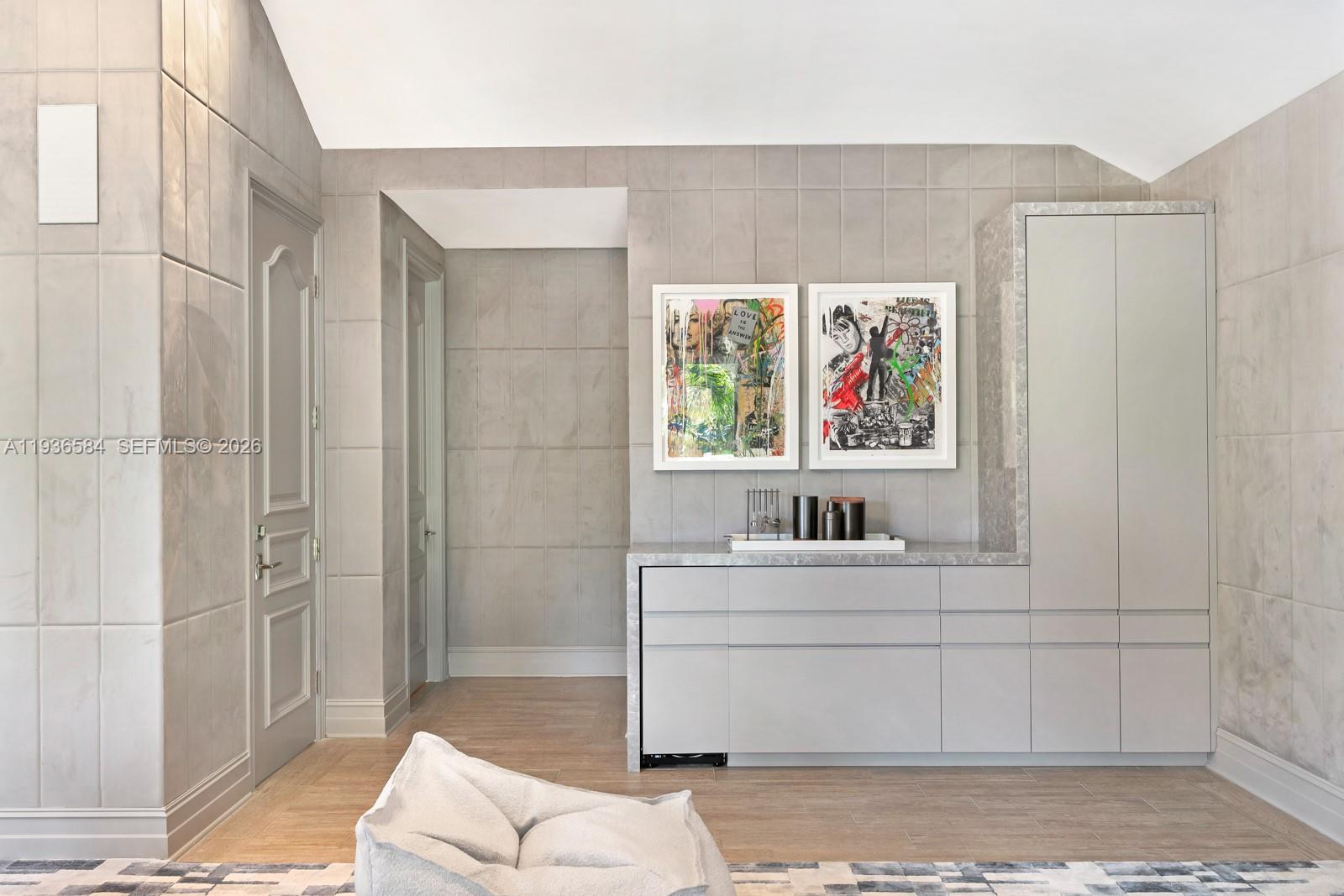 761 Buttonwood Lane Miami, FL 33137 - Photo 30 of 55 a bathroom with a sink a mirror and a shower