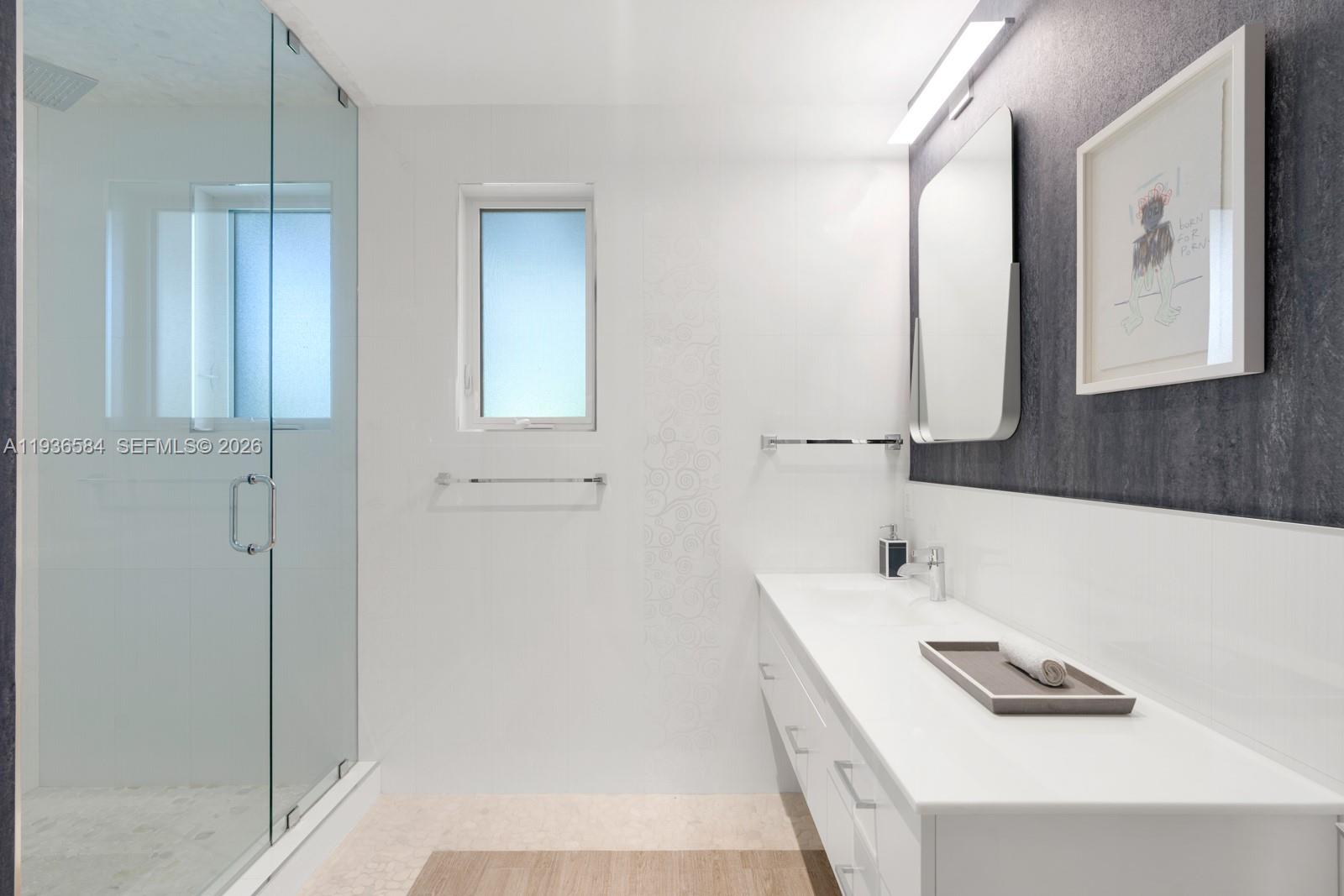 761 Buttonwood Lane Miami, FL 33137 - Photo 31 of 55 a bathroom with a bathtub and a sink