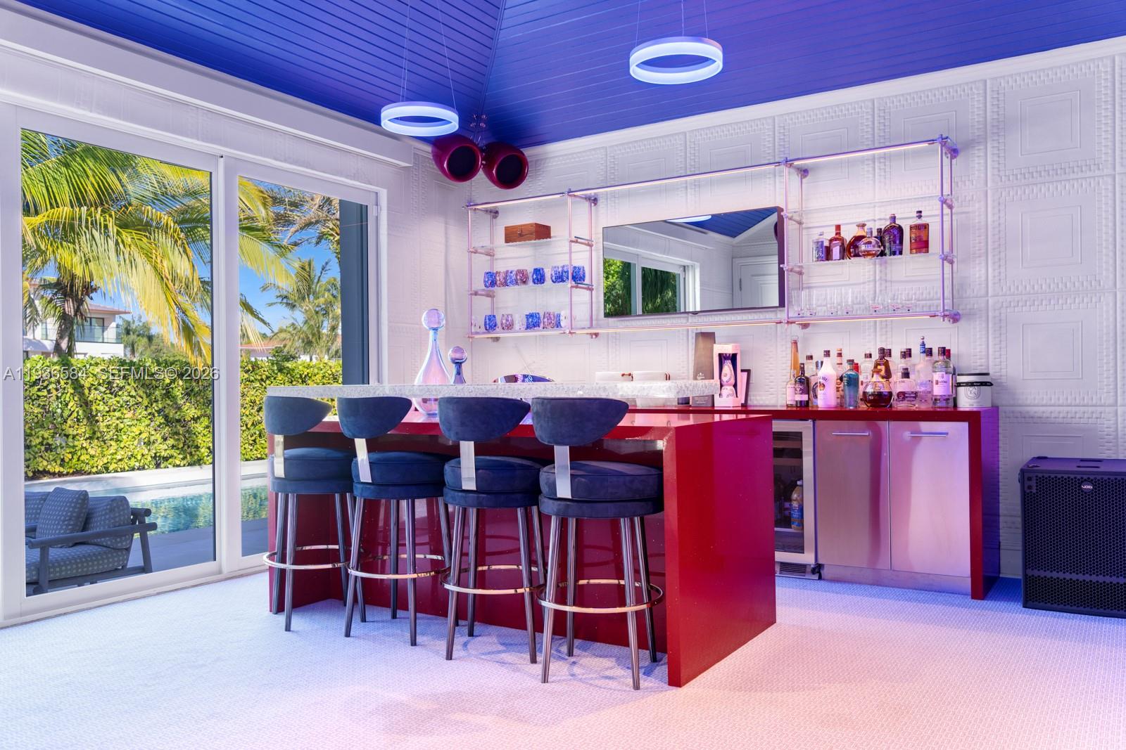 761 Buttonwood Lane Miami, FL 33137 - Photo 32 of 55 a view of a dining room with furniture window and outside view