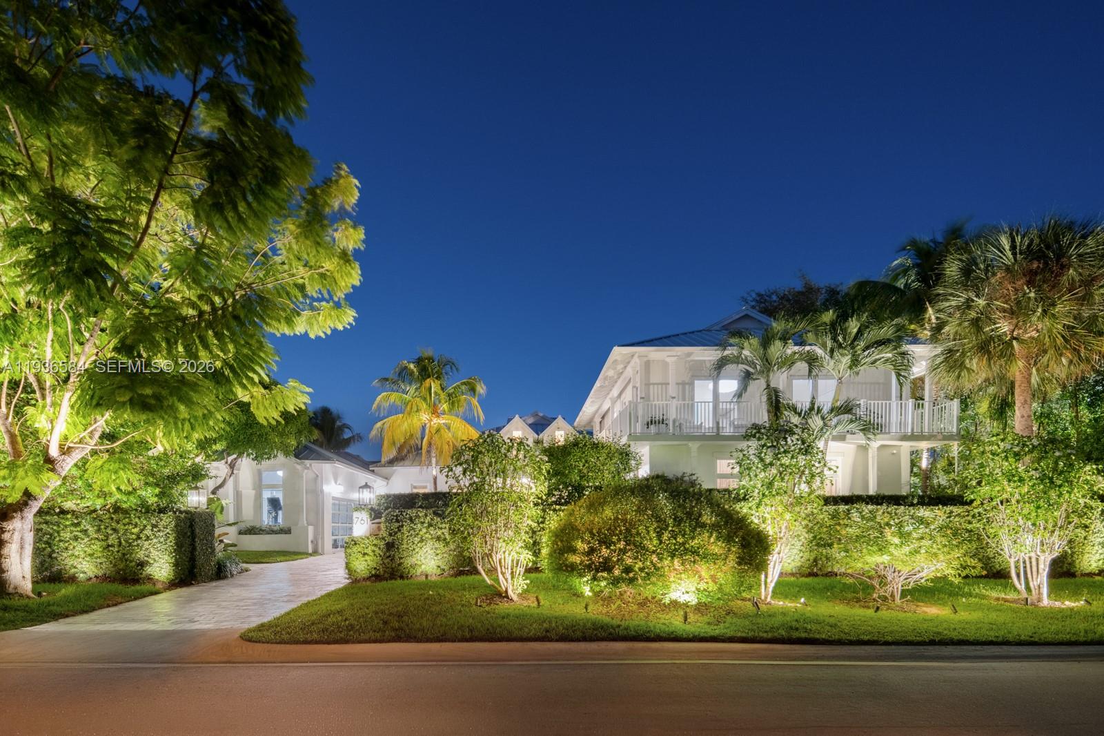 761 Buttonwood Lane Miami, FL 33137 - Photo 48 of 55 a front view of a house with a yard