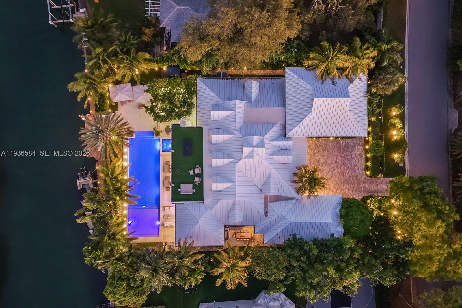 761 Buttonwood Lane Miami, FL 33137 - Photo 54 of 55 an aerial view of a house with a yard and swimming pool