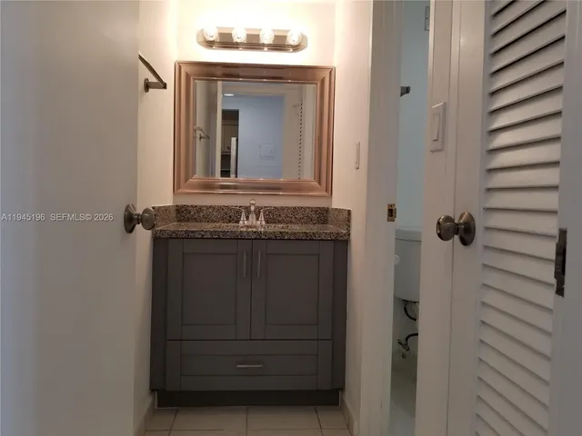 a bathroom with a shower and a toilet