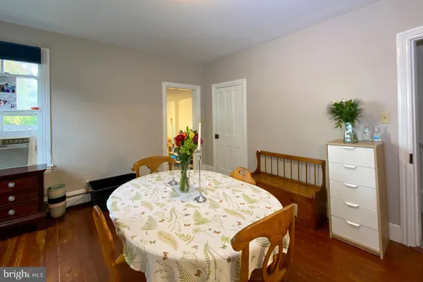 a view of a dining room with furniture