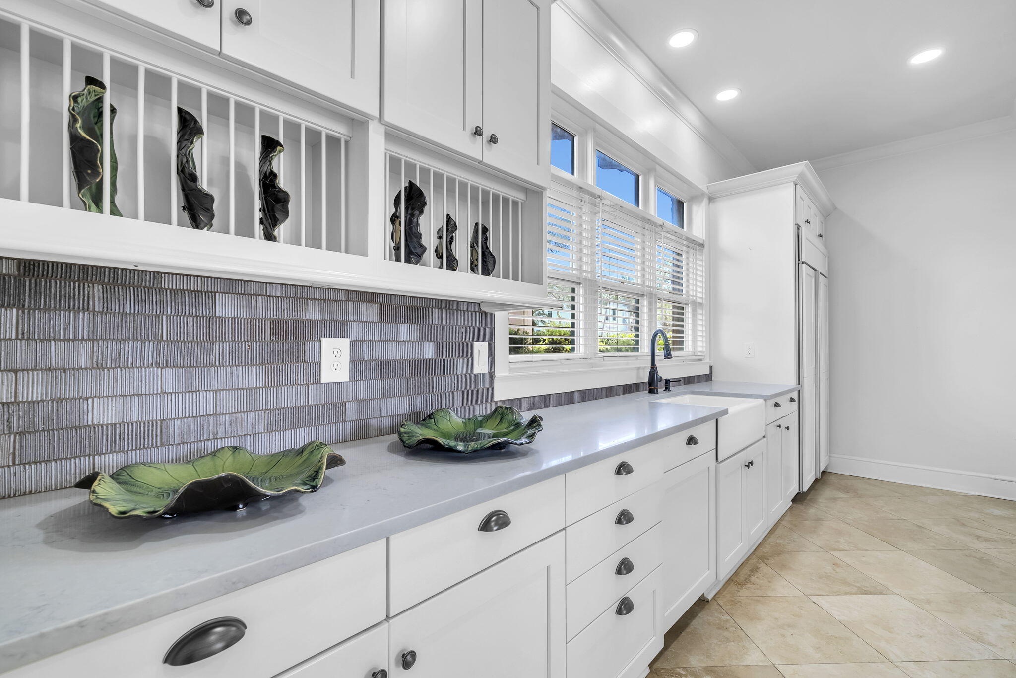 44 Tranquility Lane Destin, FL 32541 - Photo 20 of 79 a kitchen with stainless steel appliances a white cabinets and window
