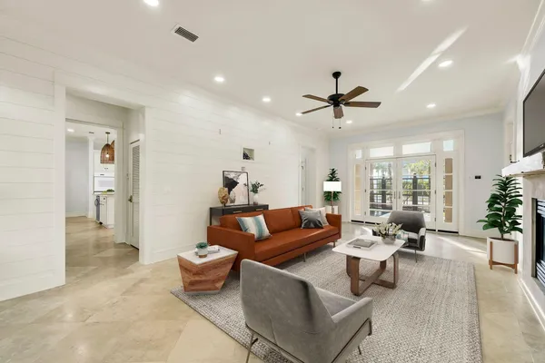 a kitchen with stainless steel appliances granite countertop a sink a oven and a large window