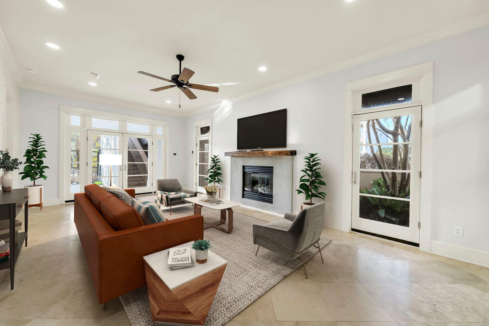 44 Tranquility Lane Destin, FL 32541 - Photo 22 of 82 a living room with furniture a fireplace and a flat screen tv