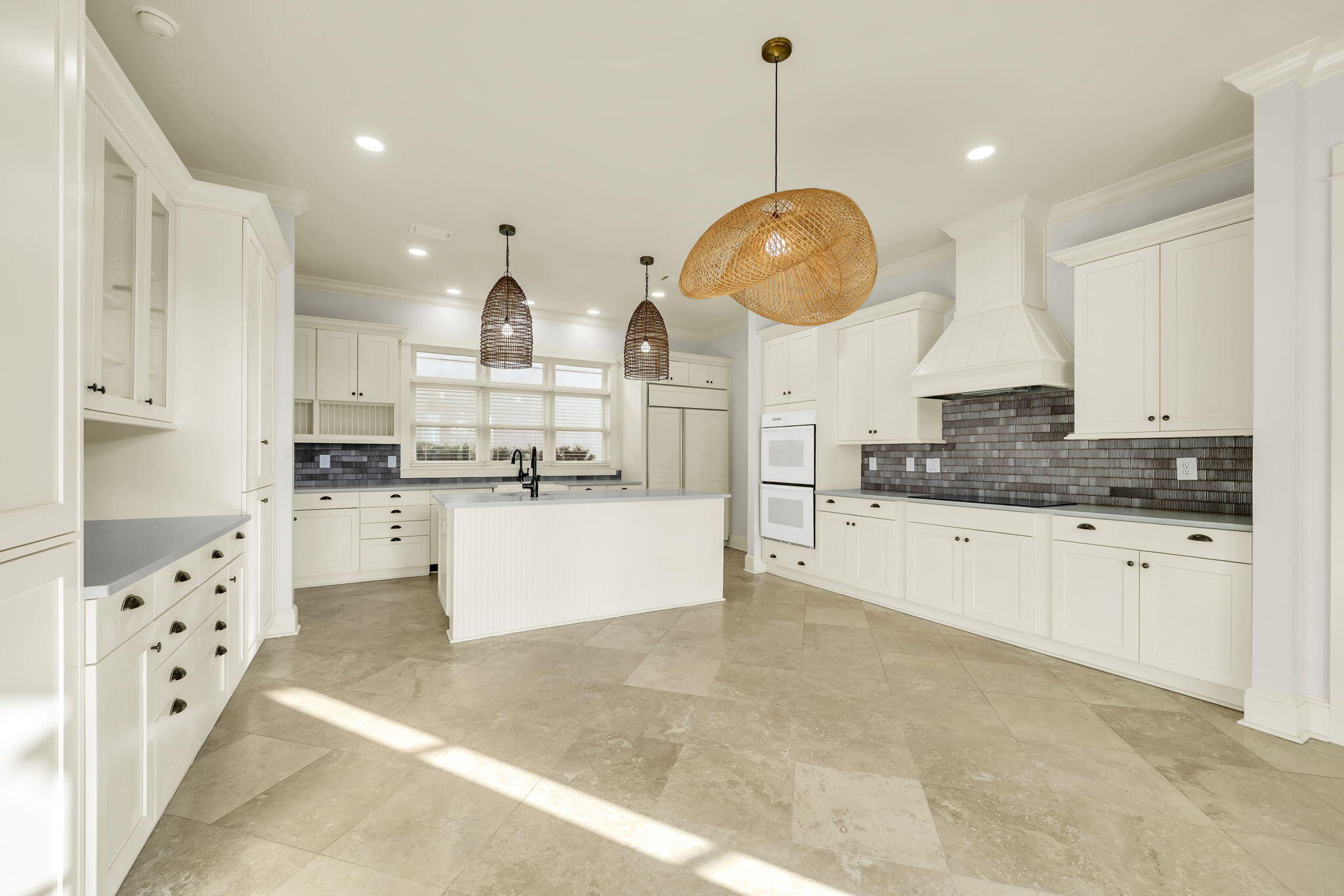 44 Tranquility Lane Destin, FL 32541 - Photo 29 of 82 a large kitchen with kitchen island stainless steel appliances a stove a center island and cabinets