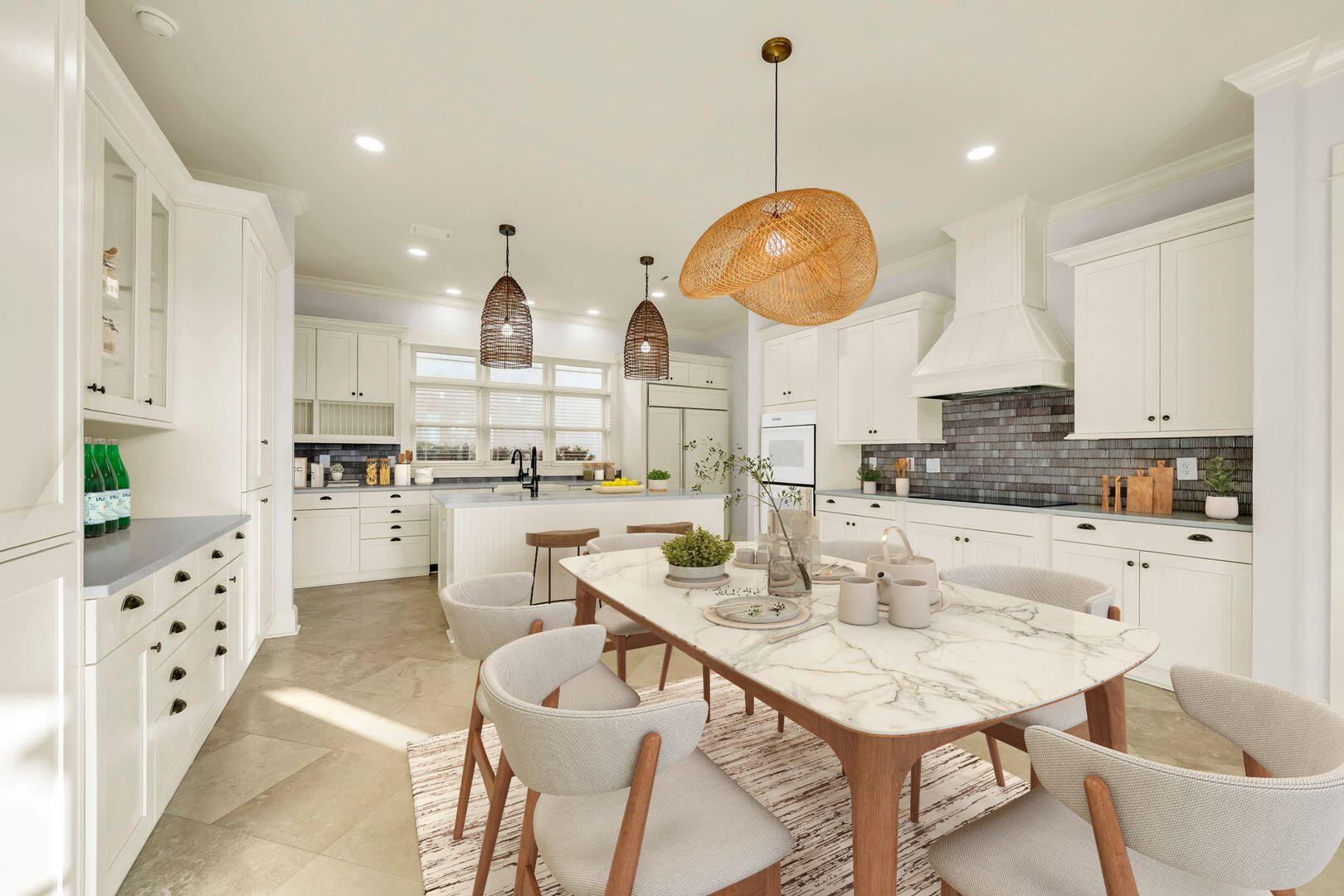 44 Tranquility Lane Destin, FL 32541 - Photo 30 of 82 a kitchen with stainless steel appliances kitchen island granite countertop a sink a stove a dining table and chairs