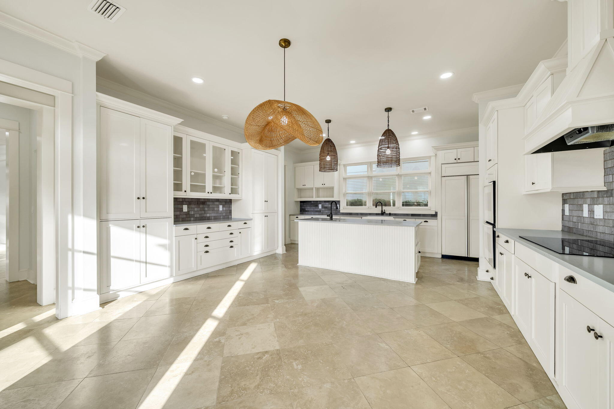 44 Tranquility Lane Destin, FL 32541 - Photo 31 of 82 a large kitchen with stainless steel appliances kitchen island granite countertop a stove a sink a refrigerator and a granite counter tops