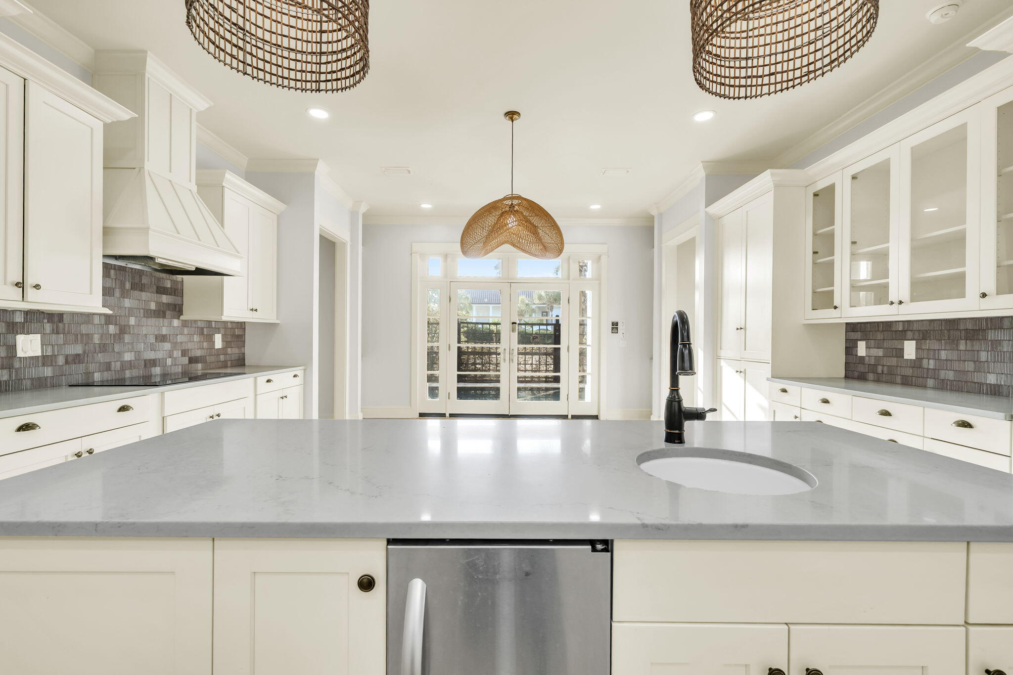 44 Tranquility Lane Destin, FL 32541 - Photo 32 of 82 a kitchen with granite countertop a sink a window and a potted plant