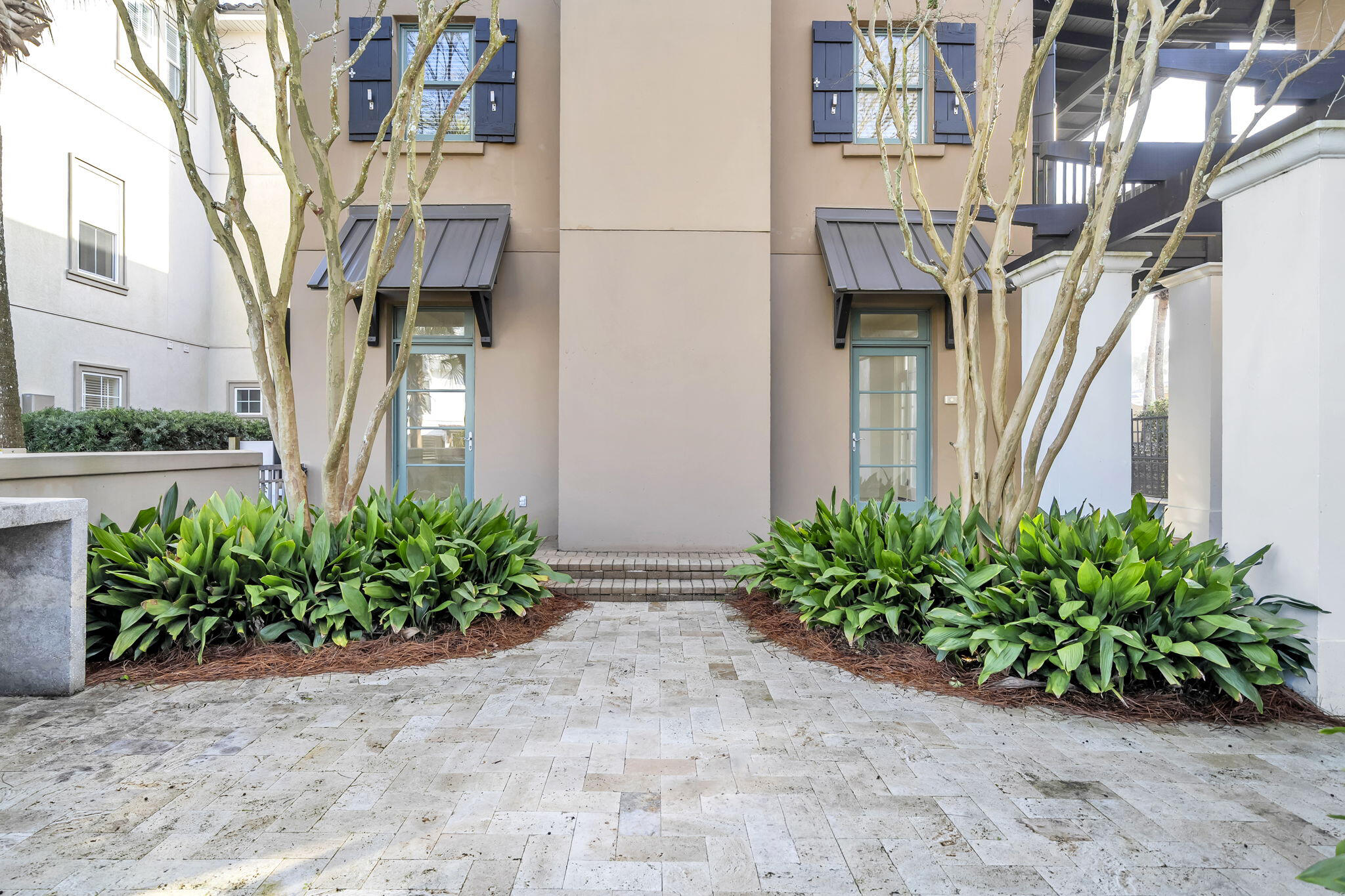 44 Tranquility Lane Destin, FL 32541 - Photo 46 of 79 a view of a pathway with a house in front of it