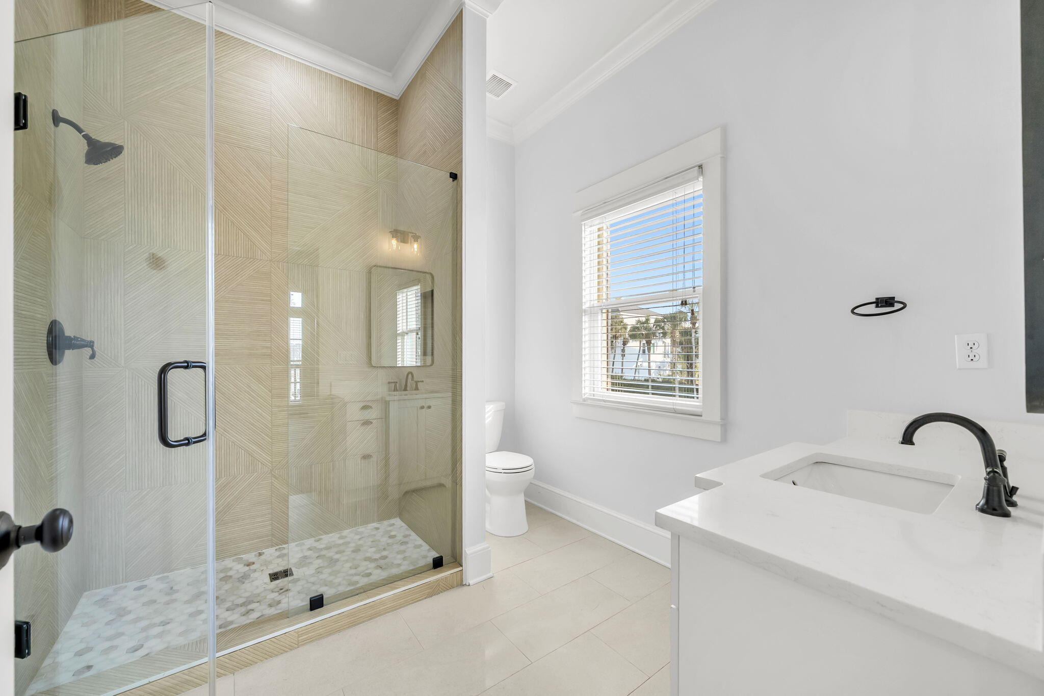 44 Tranquility Lane Destin, FL 32541 - Photo 50 of 79 a bathroom with a granite countertop shower a mirror and a sink