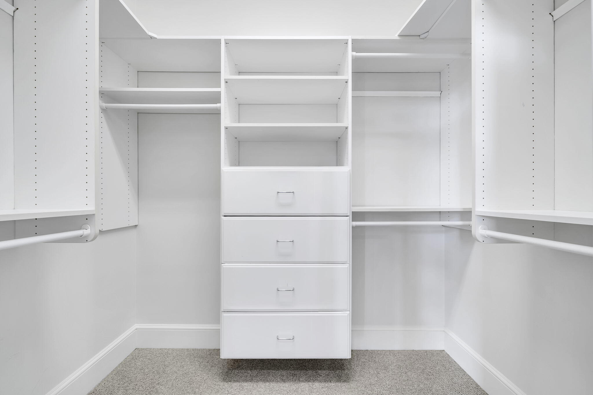 44 Tranquility Lane Destin, FL 32541 - Photo 52 of 79 a view of walk in closet with empty racks