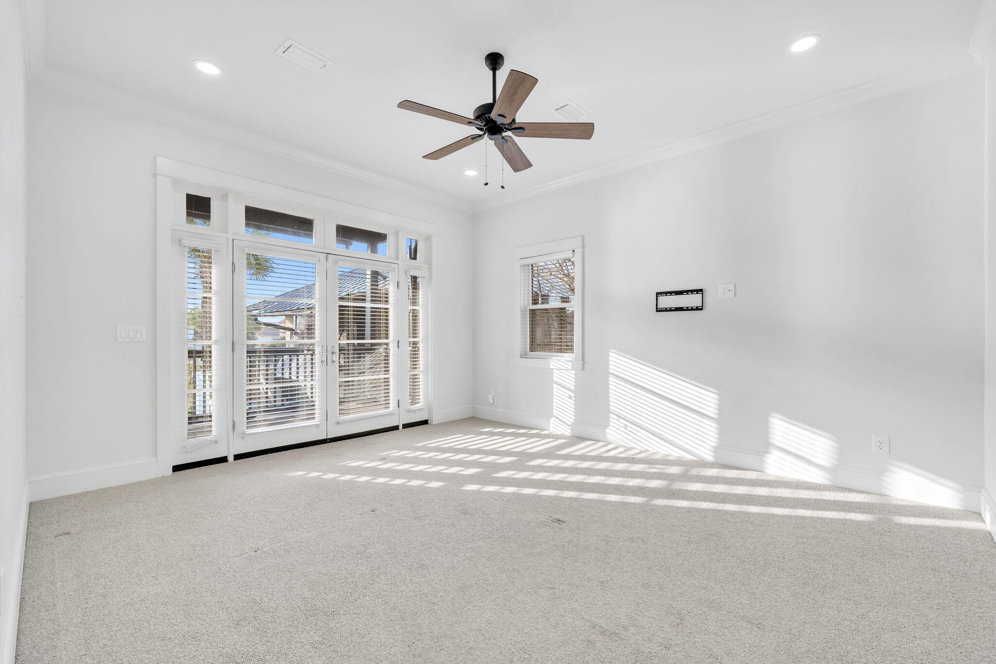 44 Tranquility Lane Destin, FL 32541 - Photo 54 of 82 a view of a livingroom with a ceiling fan and window
