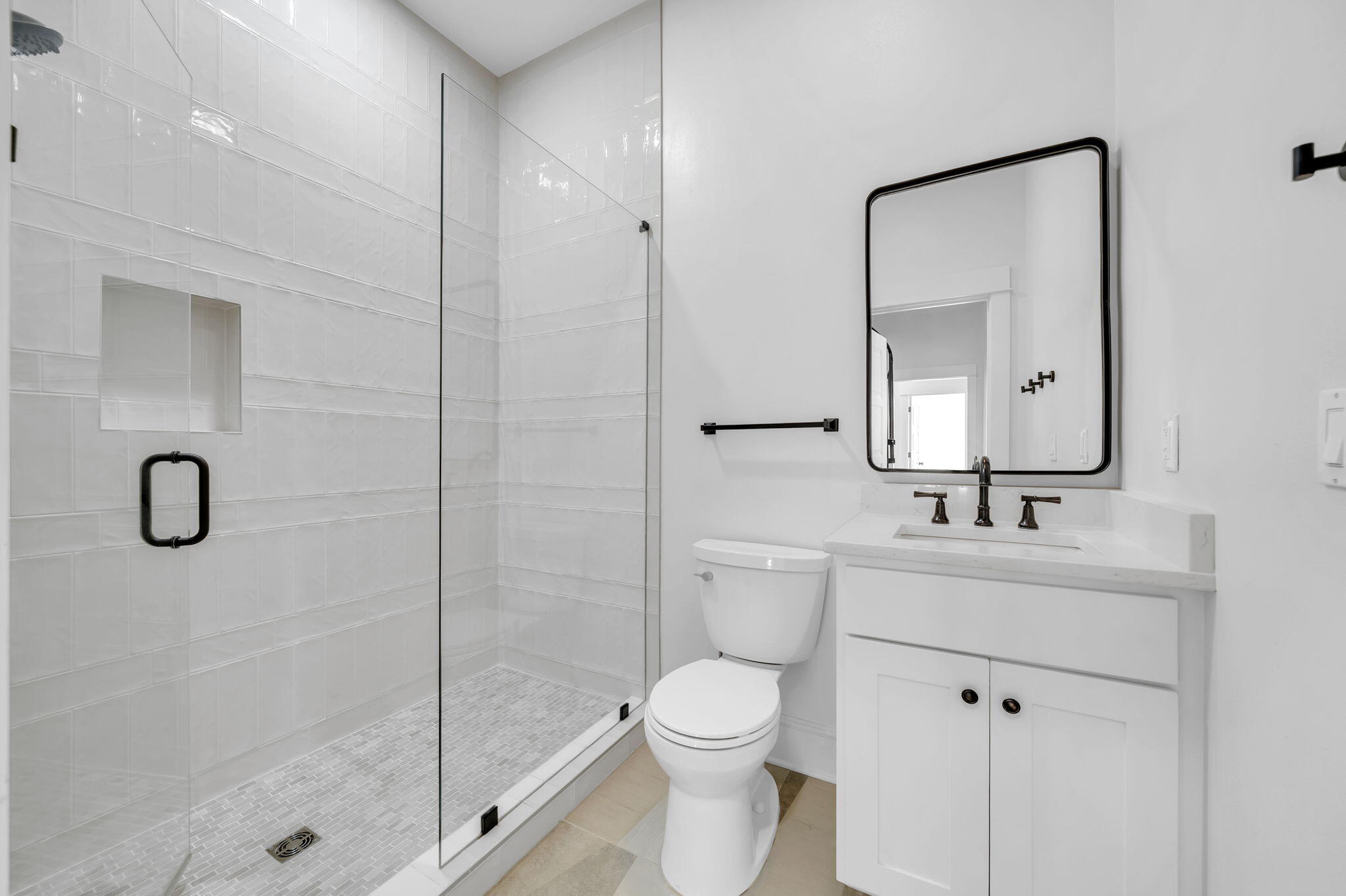 44 Tranquility Lane Destin, FL 32541 - Photo 55 of 79 a bathroom with a toilet sink shower and mirror