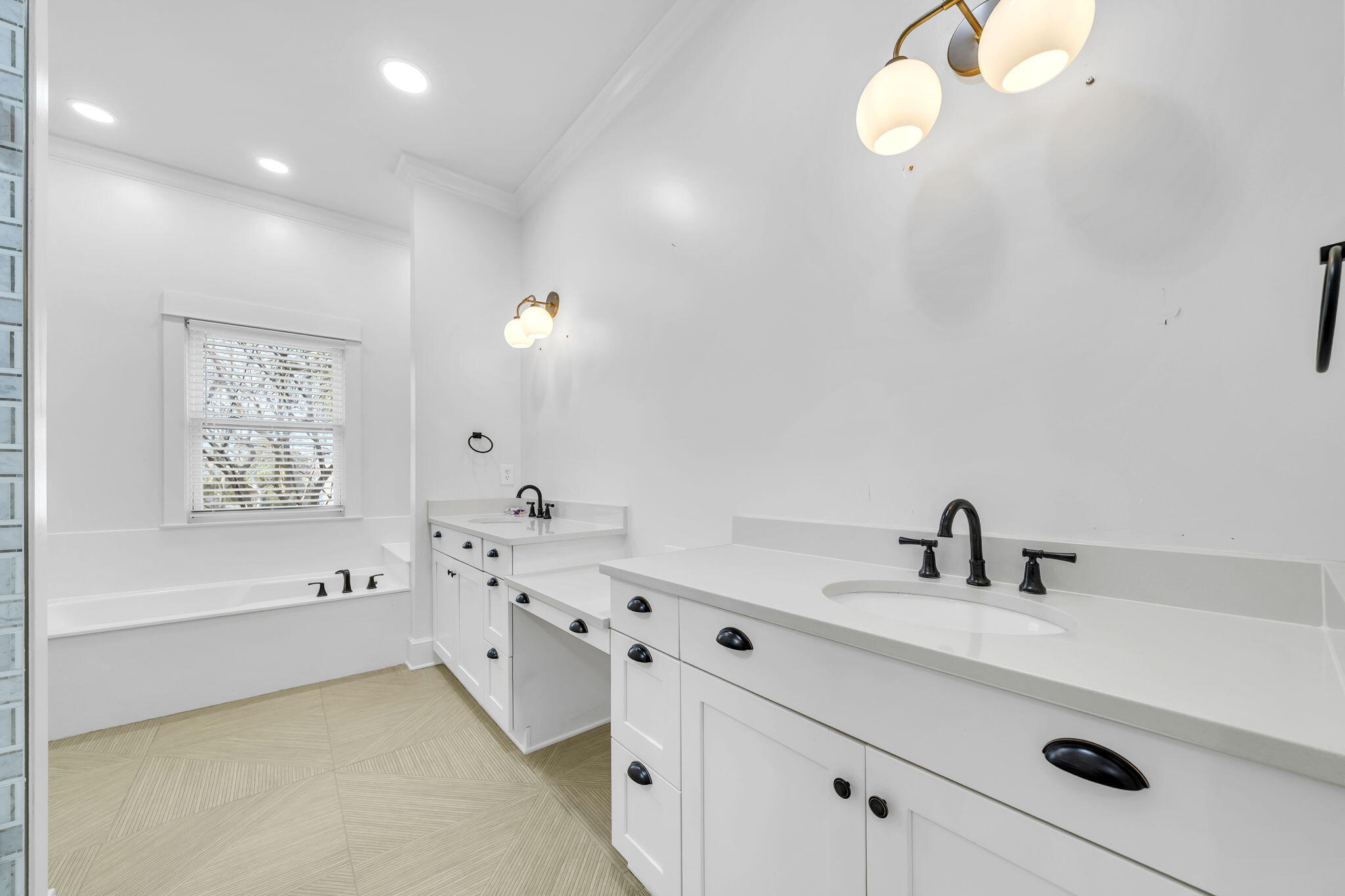 44 Tranquility Lane Destin, FL 32541 - Photo 59 of 79 a bathroom with a tub a sink and mirror