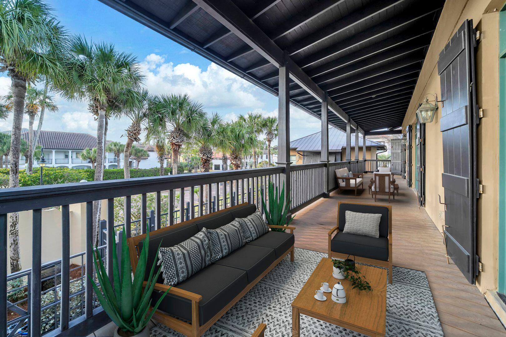 44 Tranquility Lane Destin, FL 32541 - Photo 62 of 79 a balcony with furniture and a potted plant