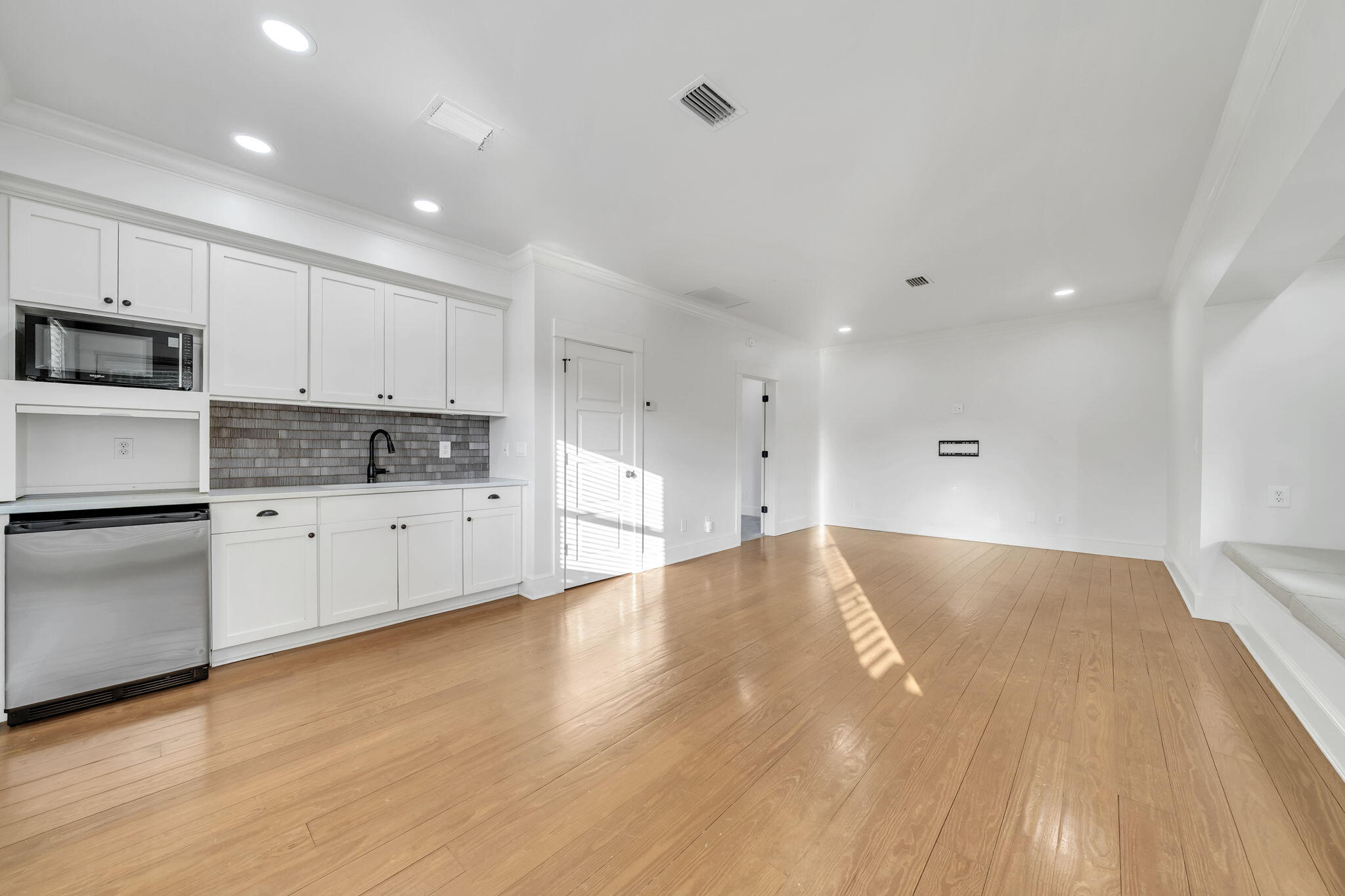 44 Tranquility Lane Destin, FL 32541 - Photo 71 of 82 a kitchen with stainless steel appliances a refrigerator sink and white cabinets
