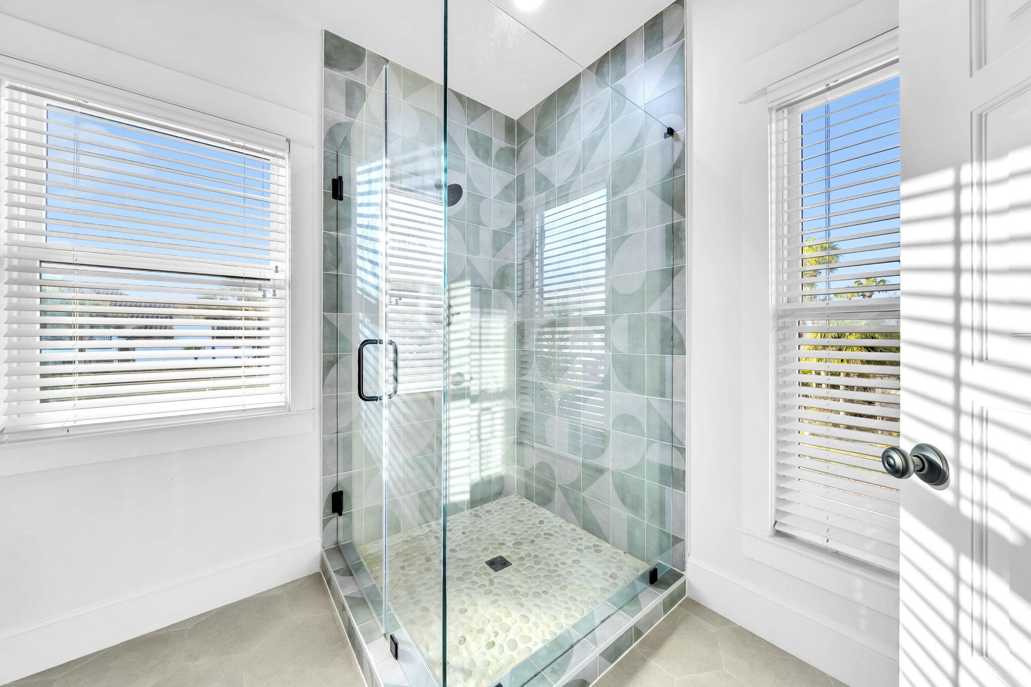 44 Tranquility Lane Destin, FL 32541 - Photo 79 of 82 a bathroom with a shower and a window