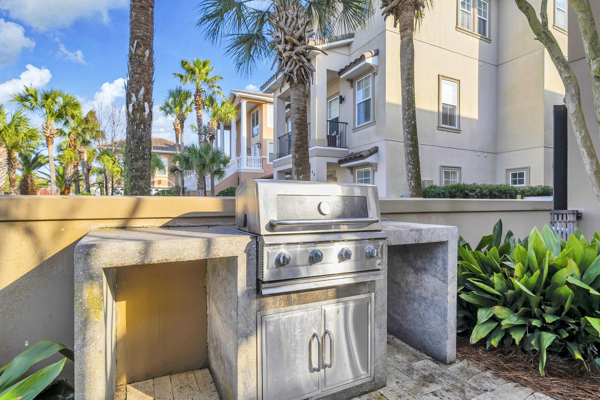 44 Tranquility Lane Destin, FL 32541 - Photo 9 of 82 a kitchen with a stove and a potted plant