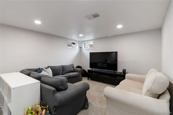 a living room with furniture and a couch