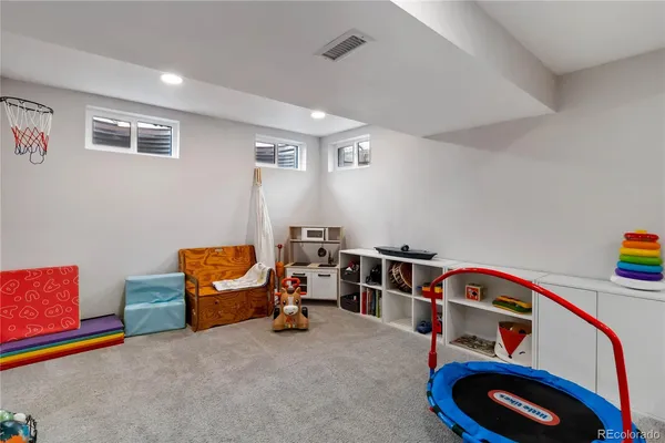 a view of a workspace with furniture