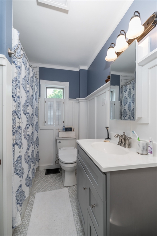 4 Linden Street Wenham, MA 01984 - Photo 14 of 27 a bathroom with a sink a toilet and mirror
