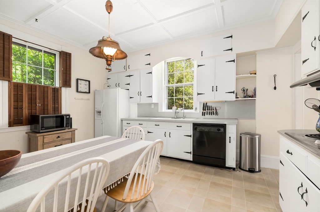 4 Linden Street Wenham, MA 01984 - Photo 20 of 27 a kitchen with stainless steel appliances a stove a sink dishwasher a refrigerator white cabinets and wooden floor