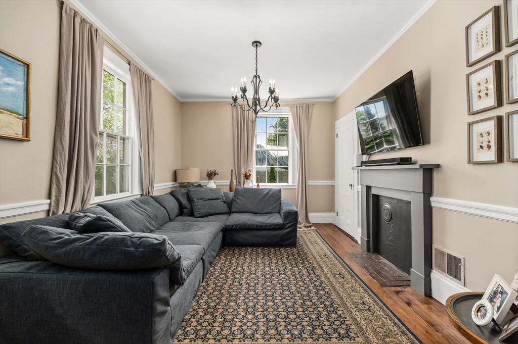 4 Linden Street Wenham, MA 01984 - Photo 23 of 27 a living room with furniture and a fireplace